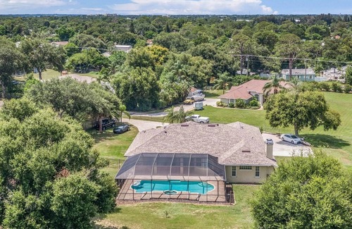 Merritt Island House | New! Fair Winds. Private Island home, heated pool, 4 bedrooms, 5 beds, 2.5 bath.