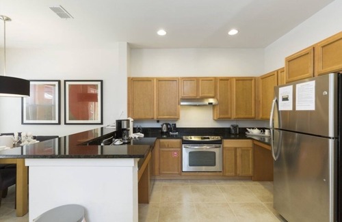 Kissimmee House | NEW! Handicap Accessible Regal Oaks Townhome with private spa and Conservation view