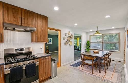 University Heights House | NEW! Iowa City 4BR Backyard Walk to Stadium