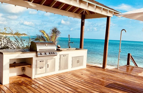 Tar Bay House | New IslandChicBeach Home! StunningViews-Pool-OutdoorKitchen-Reef-mini BballCourt