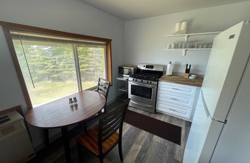 Kenai Cabin | "NEW" Kenai Beachfront Cabin 1 - In the middle of river fishing on the beach.