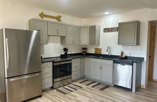 Henderson Cabin | NEW- Lake Cabin within walking distance to Marina and Water
