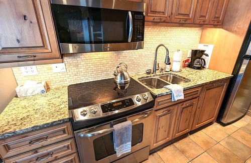 Whitefish Condo | New Lakefront Condo! Great Views! Pool/Hot Tub/Sauna/Private Beach Access! 6 Guests