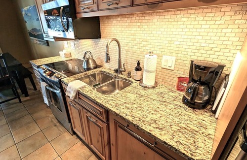 Whitefish Condo | New Lakefront Condo! Great Views! Pool/Hot Tub/Sauna/Private Beach Access! 6 Guests