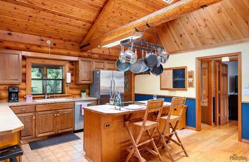 Lakeside House | New Listing! Beautiful lakefront log cabin with private dock and hot tub, boat access only!