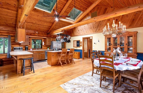 Lakeside House | New Listing! Beautiful lakefront log cabin with private dock and hot tub, boat access only!