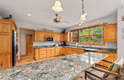 Manitowish Waters House | New Listing! Don’s Bay Estate | Lakefront Luxury with Dock, Trails & Fire Pit
