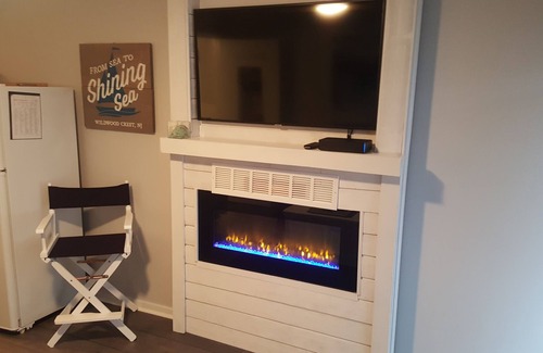 Wildwood Crest Condo | New listing- Ocean View Condo - Fireplace- ocean view from sofa. Sleeps 6