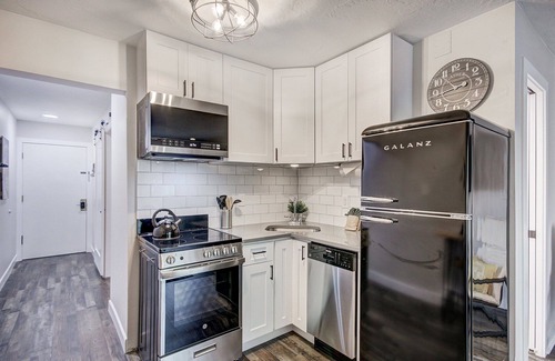 Historic District Condo | New Listing! Top Floor Top End Downtown Remodel!
