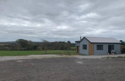 Truro House | New! Lodge with hot tub, wood burner and fab views