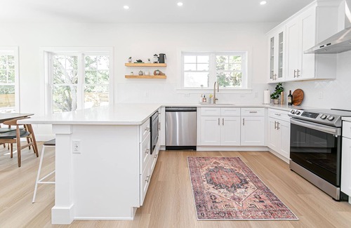 Vilano Beach House | New Luxury heated pool home, steps to the beach with two master suites!