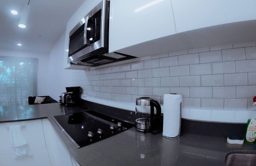 Guachipelin Apartment | New Luxury Loft with Pool by Corporate Stays