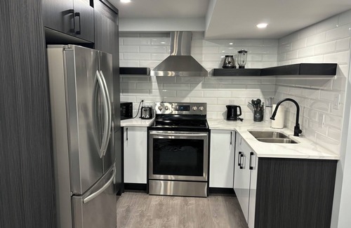 Kitchener Apartment | New Modern bright two bedroom lower level duplex with salt water pool!