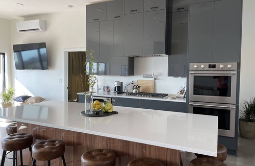 Malignant Cove House | New Modern Oceanfront Home with Year-round Hot Tub