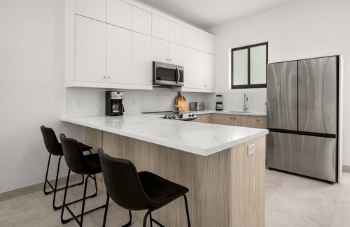 Grace Bay House | New Modern Seascape Townhome #14 in Tropical Grace Bay!
