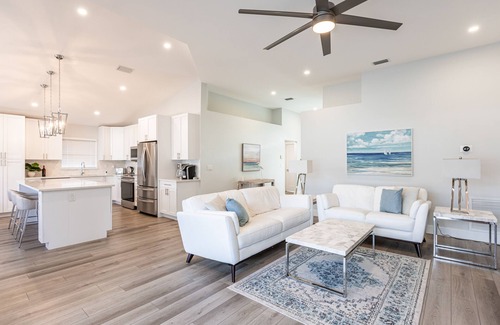 North Palm Beach Heights House | New On The Market! Newly Renovated 3BR/2BA Heated Pool & Screen Enclosure.