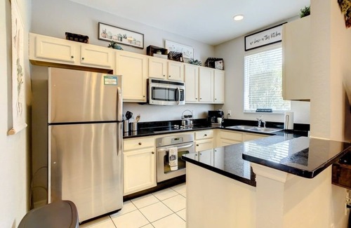 Kissimmee House | NEW! Relaxing Townhome Near Disney w/Pool, Spa, & Resort Amenities