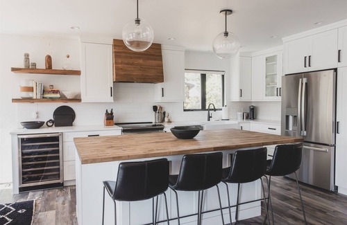Whitefish House | NEW remodel w/wood burning fireplace, wraparound deck & lake views