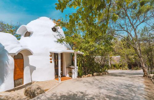 El Cacalote Cabin | New Ruins Off-The-Grid SuperAdobe Domes with Pool