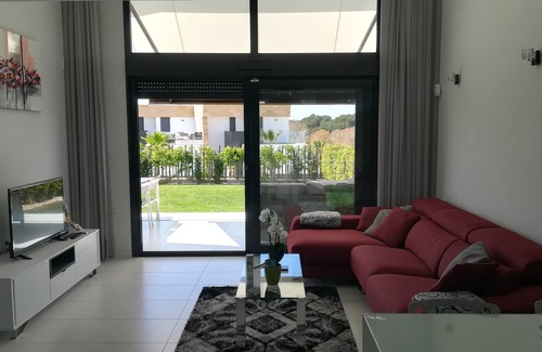 Orihuela Costa House | New semi-detached house with garden between two golf courses 4 pers