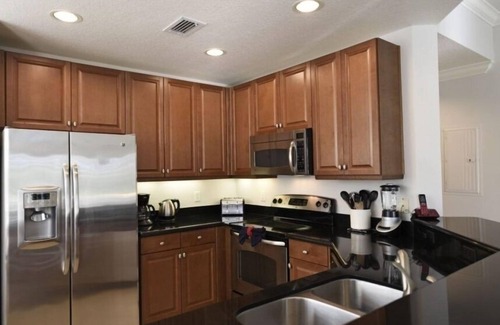 Reunion Condo | NEW! Spacious Reunion Resort Condo - Pool, Balcony, and Family-Friendly