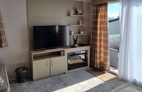 Hamworthy House | New style luxurious 3-bed caravan. Set from the rest. Based on Rockley Park