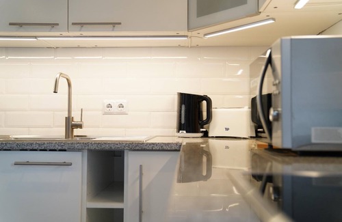 Regenhutte Apartment | Newly built loft with private outdoor seating area and balcony