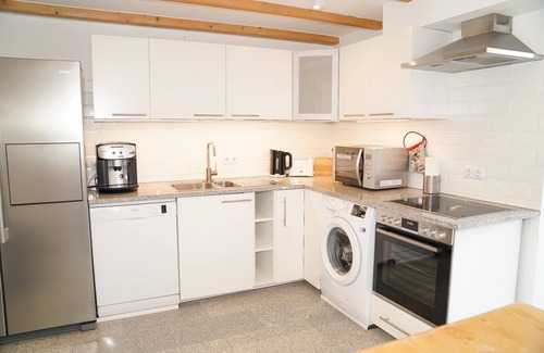 Regenhutte Apartment | Newly built loft with private outdoor seating area and balcony