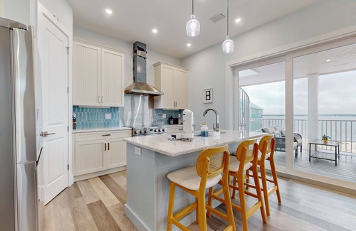 Navarre Beach House | Newly built home near beach with sound view, balcony, WiFi, W/D & AC