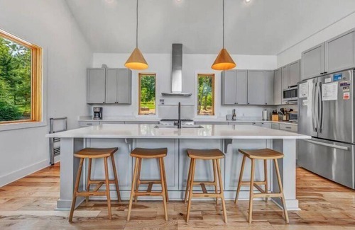 Huddleston House | NEWLY BUILT Waterfront Home on Capewood Drive!