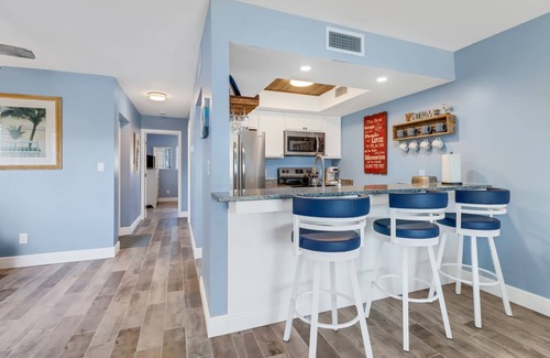 South Island Condo | Newly Remodeled, Waterfront Condo! Community Pool! Beach Gear! Over $125 of Free Daily Activities!