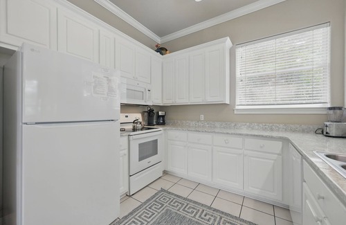 Village of Sugar Beach House | Newly Remodeled Downstairs! Pet Friendly! Heated Private Pool! Near Beach!
