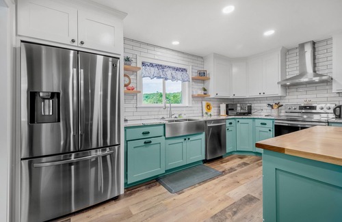 Prairie Creek House | Newly remodeled secluded home near downtown with Ping-Pong table, patio, W/D, AC