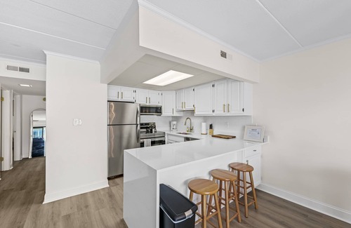 Midtown Ocean City Condo | Newly remodeled with ocean views! Steps to the beach in the heart of midtown OC!