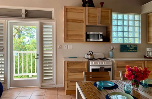 Estate Enighed Condo | Newly Renovated 2-Bedroom Condo with Sunset View & Power Generator