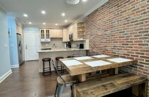 Normandy Beach Condo | Newly Renovated, Beachfront Family Oasis with Private Guarded Beach and Pool
