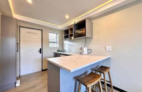 Jeffreys Bay Apartment | Newly renovated, charming studio in central Jeffreys Bay with AC, WiFi, parking