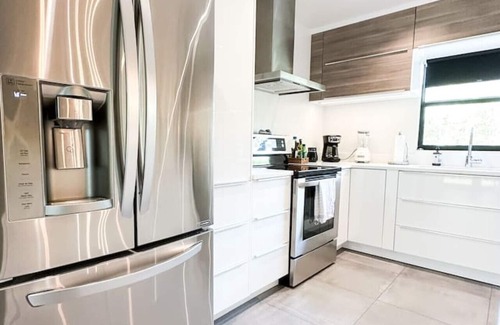 Naples Park House | Newly Renovated Contemporary Beach Retreat
