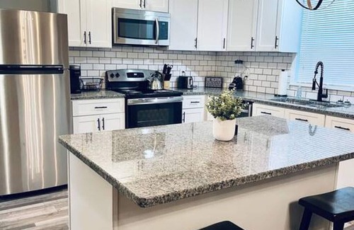 East Point House | Newly Renovated Home, Fenced Yard, Rec Room with Foosball and WiFi!