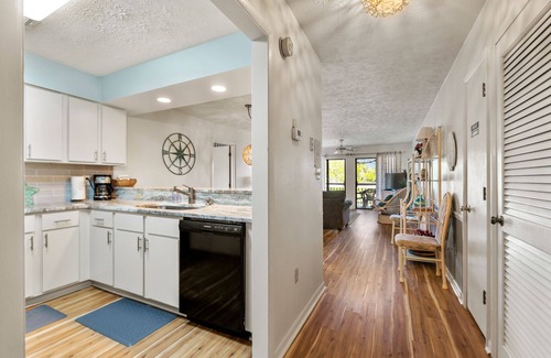 Surfside Beach Condo | NEWLY RENOVATED STEPS TO BEACH BEAUTY + Largest pool in town!