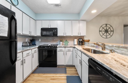 Surfside Beach Condo | NEWLY RENOVATED STEPS TO BEACH BEAUTY + Largest pool in town!