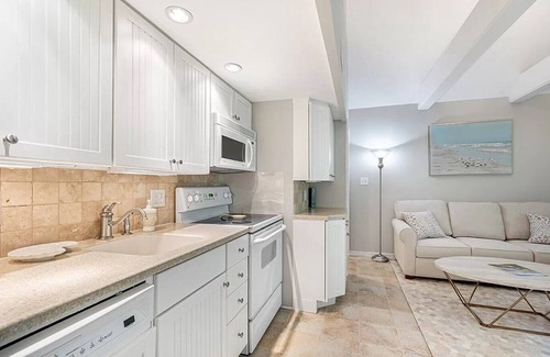 West Beach Condo | Newly Renovated Villa Steps From the Beach!