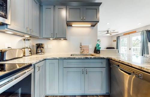 Midtown Ocean City Apartment | Newly-renovated, waterfront retreat w/a furnished deck - walk to the beach