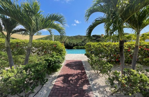 Sint Michiel Apartment | NEWLY STYLED Beach House 'White Sands' GreenView BlueBay Golf & Beach Resort Curaçao 2 bedrooms 2 bathrooms Gated Community Ground Floor Terrace Including Pool & Beach Access Fully Airconditioned Family Friendly