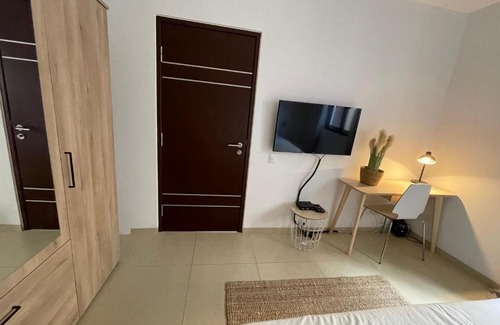 Sint Michiel Apartment | NEWLY STYLED Beach House 'White Sands' GreenView BlueBay Golf & Beach Resort Curaçao 2 bedrooms 2 bathrooms Gated Community Ground Floor Terrace Including Pool & Beach Access Fully Airconditioned Family Friendly