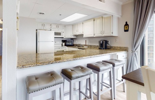 North Ocean City Condo | Newly-updated beachfront condo with balconies, views, hot tub, & indoor pool