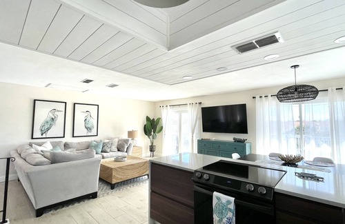 New Smyrna Beach House | Newly-updated spacious pool townhome, steps to beach - bring your boat!