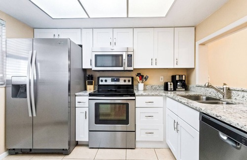 Cocoa Beach Condo | Nice and Relaxing Family Getaway - Steps to the Beach with Heated Pool