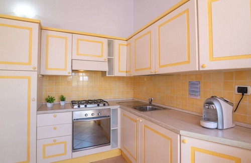 Porto Pozzo Apartment | Nice apartment for 4 guests with WIFI, A/C, TV, terrace, pets allowed and parking