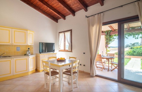 Porto Pozzo Apartment | Nice apartment for 4 guests with WIFI, A/C, TV, terrace, pets allowed and parking